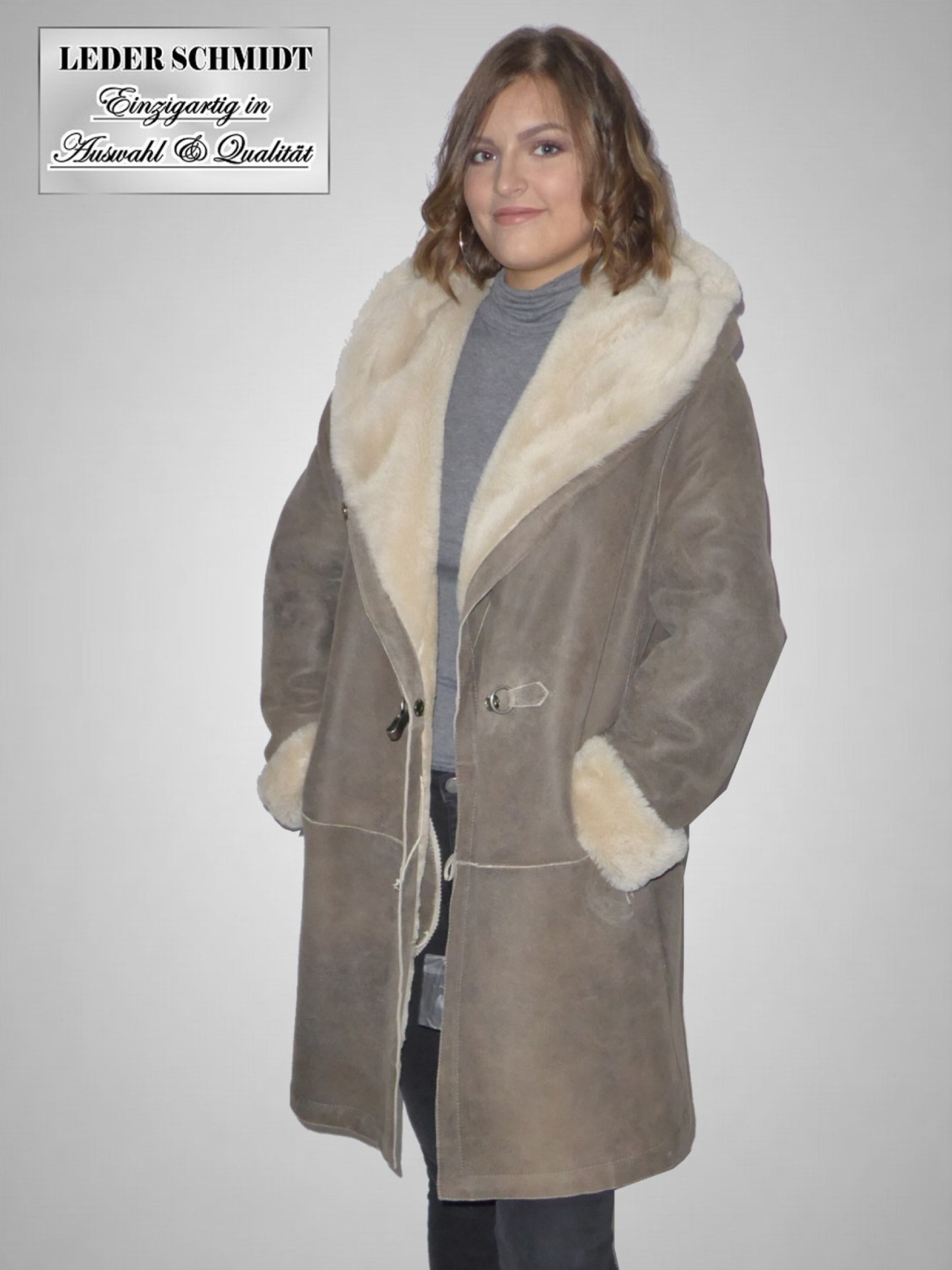 Lange Damen Lammfelljacke mit Kapuze