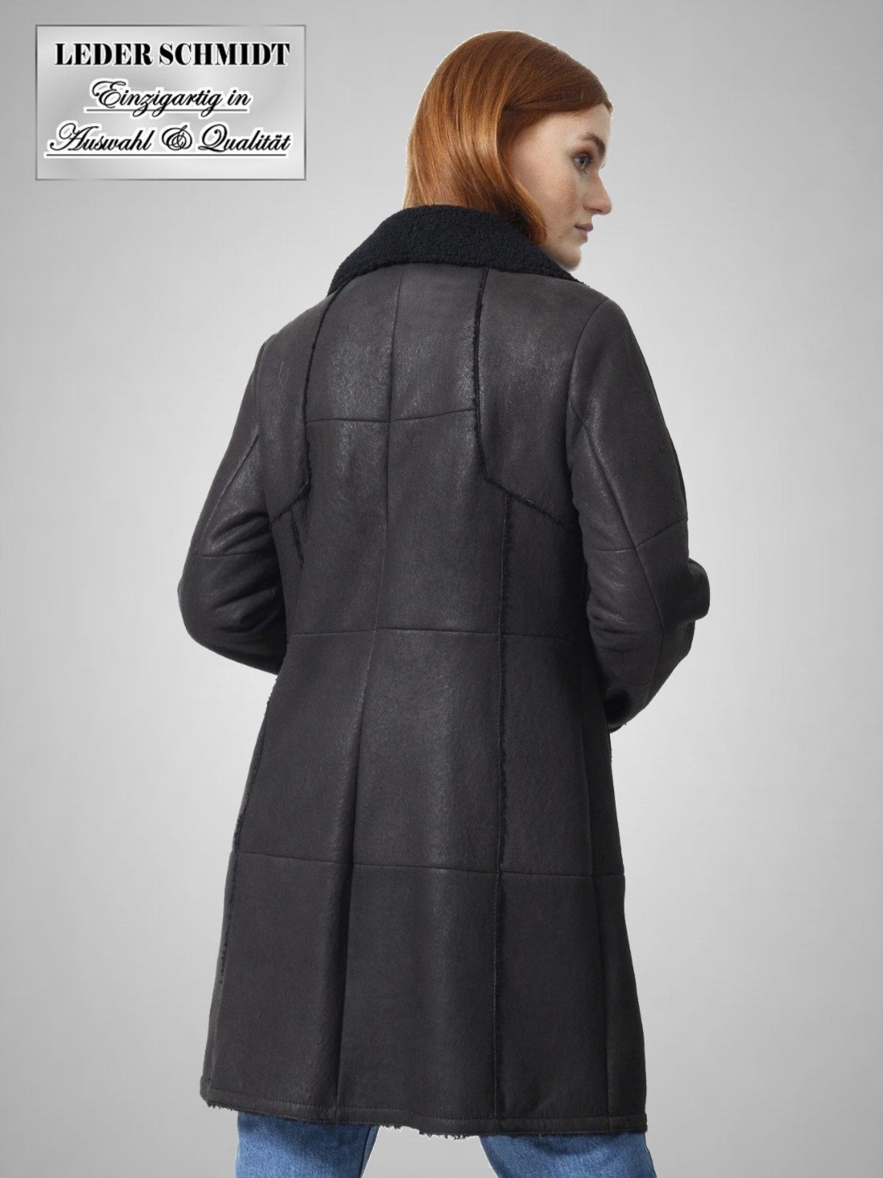 schwarze Lammfelljacke lang Dame leicht Knöpfe