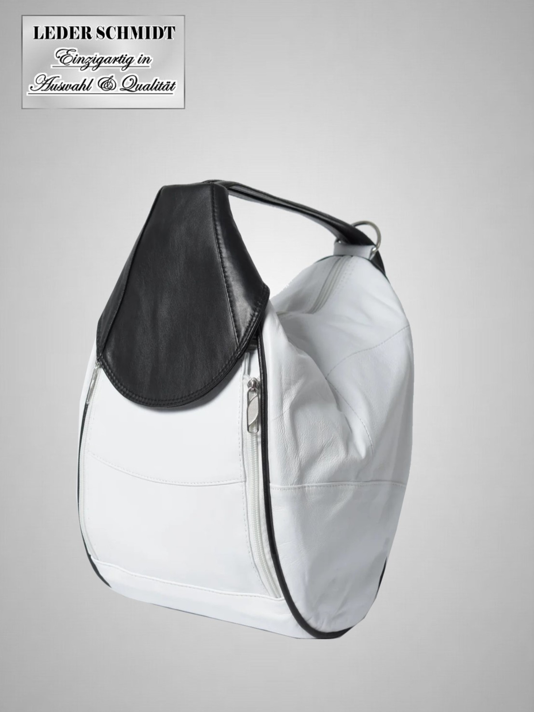 echter Lederrucksack weiß schwarz viele Taschen